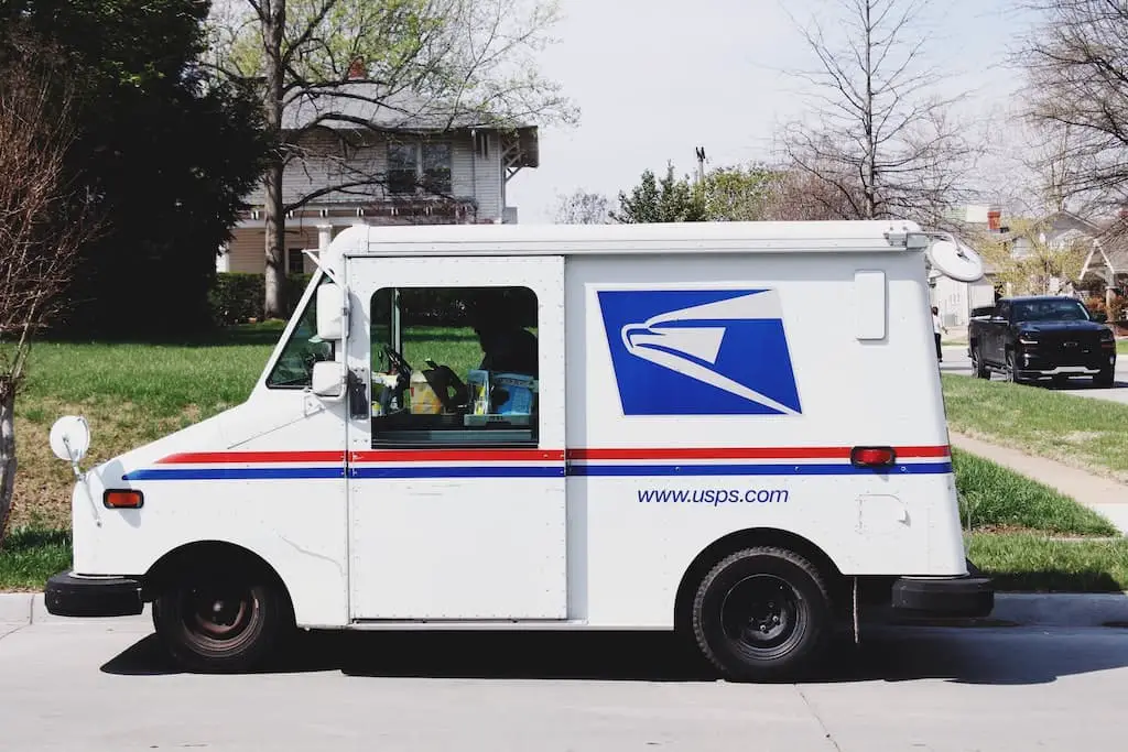 White box van with USPS logo